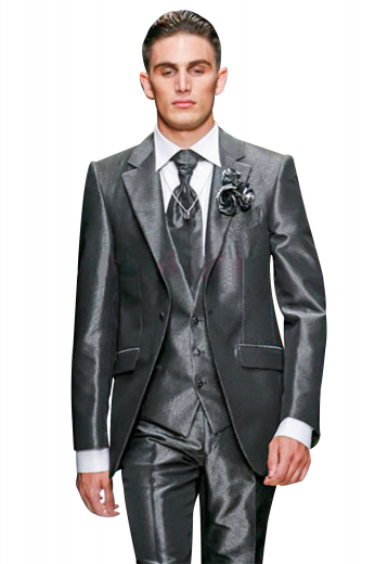An elegant 3 piece suit with a slim cut one button jacket. This single breasted jacket has straight edged notch lapels and an extravagant boutonniere on the left lapel, an upper welt pocket, and lower flap pockets. The suit is completed by a custom vest and custom fit suit pants.