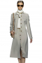 These trendy skirt suits with long jackets and calf length skirts are stylish office formals. The long jackets with high shirt collar lapels boast six contrast front closure buttons and two upper flap pockets. The A line custom skirts have a front button closure. They put to view a center vent on the front, aligned with the buttons. Can be customized for all in wool and or cashmere.