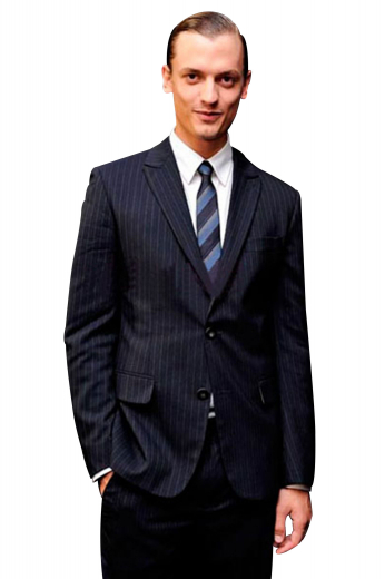 A bespoke slim cut men's suit made up of a single breasted two button suit jacket with pressed high peak lapels, paired with a pair of flat front elegant suit pants.