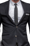 A custom tailored men's Italian wool, cashmere, and gabardine blend suit jacket tailor made by skilled experts. This made to measure slim cut single breasted two button jacket with tailor made standard welt pocket and handmade straight edged lapel is a definite head turner.