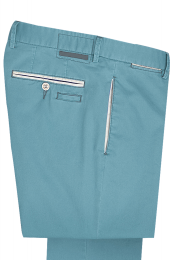 A pair of custom tailored slim-cut men's casual slacks with tailor made on-seam pockets in the front, made to measure double piped back pockets, and excellent detailing.