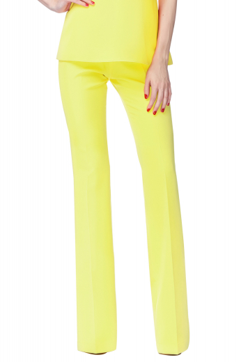 sexy slim cut formal pants with flare legs. These bootcut yellow pants close on the front with a zipper fly and buttons on the waistband. Ideal for work purposes and interviews, these custom pants can be made with wrinkle resistant fabrics.