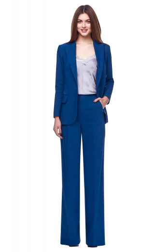 This womens custom made royal blue wool pant suit features a womens handmade jacket with 1 front close button and custom made dress pants with a flat front. The womens tailor made jacket has 4 inch wide lapels and 2 lower pockets with flaps. The mens made to order loose fit suit pants have 2 front slash pockets, a 2 point button and hook closure, a zipper fly, and hand sewn cuff hems. You can buy this womens tailor made royal blue pant suit at My Custom Tailor at super affordable rates.