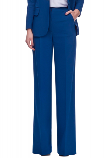 These womens custom made royal blue cashmere wool suit pants from the range of premium affordable garments at My Custom Tailor features a flat front and 2 front slash pockets. These womens bespoke loose fit royal blue suit pants also feature a 2 button and hook closure, a zipper fly, and a wrinkle resistant smooth finish. You can wear these womens handmade wool dress pants with womens custom made slim fit blouses to flaunt an iconic work look. 
