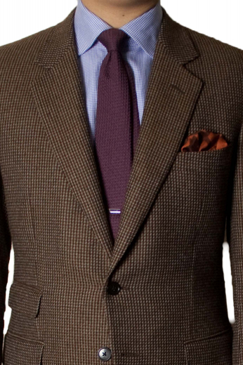 This stunning mens handmade dark brown alpaca wool blazer is a visual delight with its representation of 2 elegant 3 inch wide notch lapels and 2 front close buttons. This mens tailor made slim fit brown jacket also features 1 boutonniere on the left lapel, 1 upper welt pocket, 2 lower pockets with flaps, and a flap ticket pocket on the left. You can buy this mens bespoke alpaca wool brown blazer at My custom Tailor to flaunt an unbelievably trendy work look. 