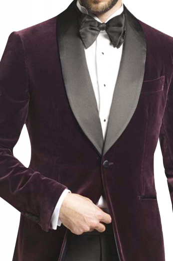 This mens tailor made velvet tux features a bespoke dinner jacket in wine and custom made grey dress pants. The mens handmade slim fit jacket has a shawl collar with grey satin facing lapels, 2 satin piped lower pockets, 1 upper welt pocket, and 1 front close button. The mens bespoke slim fit dress pants have 2 front slash pockets, 2 back pockets, a zip fly, and a 2 point button and hook closure. Buy this stunning mens handmade slim fit dinner suit at My Custom tailor to flaunt a dapper look at weddings and corporate parties. 