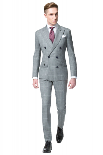 Iconic mens handmade double breasted grey suit in 150s wool. This mens tailor made plaid suit features a slim fit double breasted jacket with 6 front buttons, 2 to close and bespoke plaid dress pants with a high waist. The mens custom made plaid dinner jacket features peak lapels with 1 boutonniere on the left lapel, a center vent, 2 lower flap pockets, and 1 upper welt pocket. The mens tailor made slim fit dress pants have 2 front slash pockets, 2 back pockets, a zip fly, and a 2 point button and hook closure.