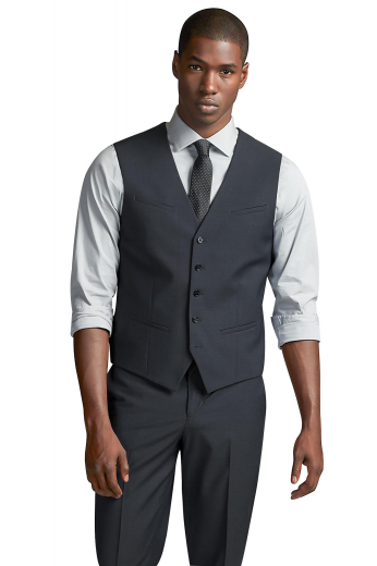 Dark grey cashmere wool bespoke vest for men. Perfect for board meetings and interviews. This iconic mens tailor made slim fit vest features a comfortable V-neck and 5 front closure buttons. With a classic representation of 2 lower piped pockets and a single hand sewn slanted upper welt pocket, this mens bespoke wool vest is ideal for men who like simplicity and comfort. Buy this mens tailor made waistcoat at My Custom Tailor at affordable rates never seen before. 
