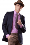 This spectacular mens purple bespoke blazer is handmade with cashmere wool of the highest quality. This blazer is also a perfect custom made golf jacket. It puts to display a classy slim cut finish with a 2 button front closure, 2 wide notch lapels, and 2 deftly sewn rounded lower patch pockets. It can be ordered with a modification of lapels and pockets hand stitched at the edges by skilful weavers at My Custom Tailor upon customisation request.
