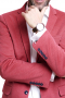 This is one luxuriously designed wool blazer for men that brings out an exciting shade of salmon. It is custom made to fit your needs and it sports an elegant upper welt pocket and two standard lower pockets with flaps. Neat columns of notch lapels and a slim-fit cut are enough to bring out that extra elegance that all men possess. It can also be handmade to feature edge stitched lapels and pockets for added sense of sophistication that will make you look every bit professional and classy.  