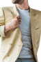 This men's tan custom blazer is tailor made in a fine wool and cut to a slim fit, featuring single breasted button closure and notch lapels. It is perfect for all formal and special occasions. 