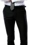 This men's custom made black trouser is cut to a perfect fit! It is tailor made in a fine wool blend and cut to a slim fit, featuring slash pockets, extended belt loops and a flat front pleat.
