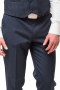 This men's navy pant is tailor made in a fine wool blend and cut to a slim fit, featuring slash pockets and a flat front pleat. 