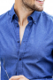 This men's slim cut dark blue button down is tailor made in a fine linen blend and features a button down collar and rounded barrel cuffs. It is cut to a perfect fit and is a sleek option for any formal occasion!