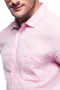 This soft pink men's button up shirt is tailor made in a fine cotton and cut to a slim fit, featuring rounded barrel cuffs and a semi spread collar, perfect for office wear. 