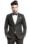 This men's pant suit is tailor made in a fine wool blend and cut in a slim fit, featuring notch lapels, single breasted button closures, fabric covered buttons, and hand sewn cuffs.
