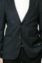 This men's pant suit is tailor made in a fine wool blend and cut in a slim fit, featuring high notch lapels, single breasted button closures, and hand sewn cuffs.