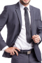This handsome grey men's pant suit is tailor made in a fine wool blend and cut in a slim fit, featuring notch lapels, two button single breasted button closures, and slash pockets.