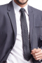 This handsome grey men's pant suit is tailor made in a fine wool blend and cut in a slim fit, featuring notch lapels, two button single breasted button closures, and slash pockets.