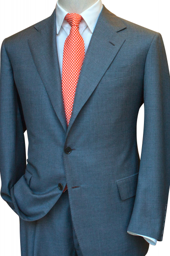 This handsome men's pant suit is tailor made in a fine wool blend and cut in a slim fit, featuring notch lapels, single breasted button closures, and slash pockets.