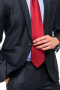 This sleek men's pant suit is tailor made in a fine wool blend and cut to a slim fit, featuring a single breasted button closure, handsewn cuffs, and piped pockets. 