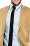 This men's pant suit is tailor made in a fine wool blend and cut in a slim fit, featuring satin notch lapels, single breasted button closures, and slash pockets. It is perfect for all business events and occasions.