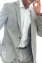This men's slim fit pant suit is tailor made in a fine wool blend, featuring a single breasted button closure, notch lapels and slash pockets.
