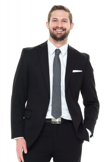 Style no.16812 - This classic men's black suit in a slim fit cut features two button, center vents, flap pocket. The pants feature a slash pocket and two back pockets, making for a practical and sleek option for your formal occasion.