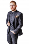 This men's pant suit is tailor made in a fine wool blend and cut to a slim fit, featuring a single breasted button closure and horizontal pockets. 