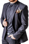 This men's pant suit is tailor made in a fine wool blend and cut to a slim fit, featuring a single breasted button closure and horizontal pockets. 