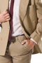 This khaki men's pant suit is tailor made in a fine wool blend and cut to a slim cut, featuring slash pockets and a double breasted button closure. 