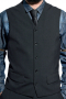 This black men's vest is tailor made in a wool blend, featuring a single breasted closure, v neck, and flapped lower pockets. 