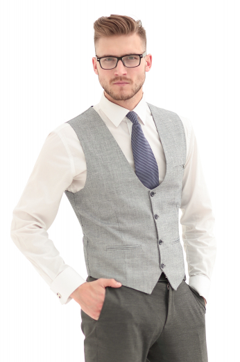 This men's slim cut vest is tailor made with a single breasted closure in a wool blend, featuring piped lower pockets and a four button closure.