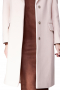 A stunning women's bespoke tailored neutral coat with a classic three button closure. This women's outer coat is perfect for all your winter needs! It features a single breasted closure and hits just at the knee. 