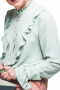 This women's mint blouse is custom made with beautiful attention to detail and care with gorgeous ruffle detailing and embroidery.