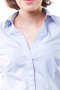 Custom made white-washed pastel blue women's tailored formal shirt with rounded barrel cuffs and a hidden button front, this women's slim cut blouse features a beautiful Ainsley collar.