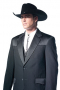 An exceptional men's professionally tailored single breasted  western style suit in a classic black made up of a made to measure pair of comfortable well ventilated bespoke suit pants matched with a hand tailored single breasted suit jacket designed with a modern elegant design for the sophisticated cowboy.