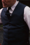 A great buy for any man is this highly flattering bespoke vest in a classically sophisticated navy that gives serves well as this custom single breasted vest perfectly blends vintage and modern sophistication.