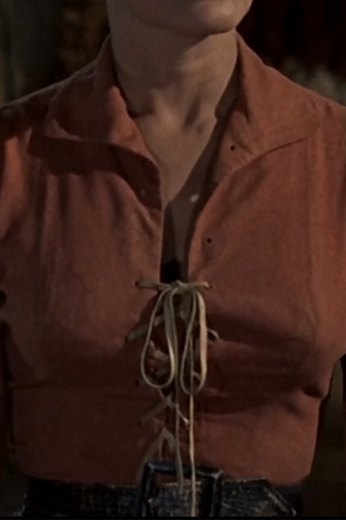Any vintage fashion film fan will love this El Dorado blouse in a sienna tan orange just as worn in the hit film. This women’s movie blouse is a great buy not just for cosplay events but also for casual wear.