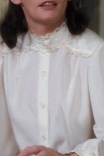 Buy this custom tailored women’s blouse worn by actress Margot Kidder as Lois Lane in the epic 1980 Superman II film. This white summer blouse is available to order online.
