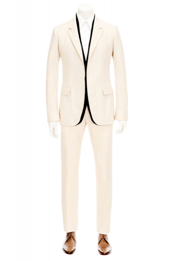 A made to measure slim cut suit composed of a handmade single breasted two button suit jacket with pressed shallow notch lapels, paired with classic flat front suit pants.