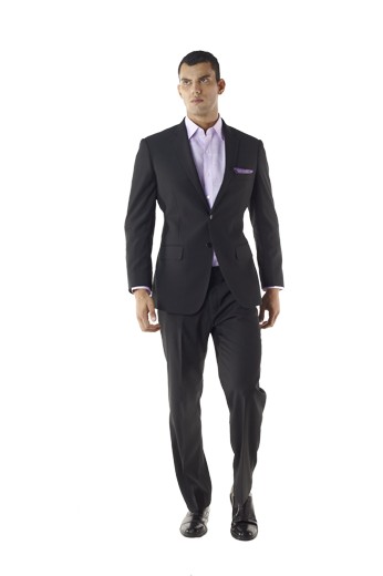 Two Button Men Tailored Black Suit - With its lightly padded shoulder and fitted jacket, this custom two piece custom suit embodies the best of updated tailoring. The two button looker features flap pockets, notch lapel, sous bras accompanied with flat front trousers.
