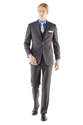This three piece custom suit designed with sous bras, patch pockets and flat front trousers is made for those on the go. The suit is accompanied with a five button waistcoat which makes it suitable for any formal occasion.