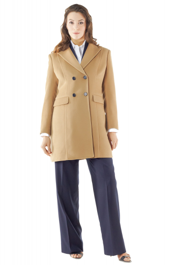 Handmade with cashmere, these tan winter overcoats are classy party-wear formals for working women. Front and back darts from shoulder seam to hems and slanted flapped lower pockets make these regal coats comfortable for everyday use too. They display a back center vent and four front buttons, two to close. Can be worn with casual denims for a semi-formal look.