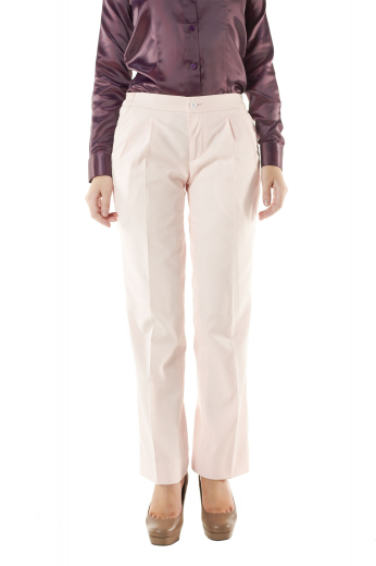 Stunning off-white pants with reverse double pleats and vertical pockets. Snug fit with a zipper fly and a buttoned waistband for front closure, these handmade pants put to view beautifully hand sewn hems and cuffs. They can be styled with custom shirts and vests.