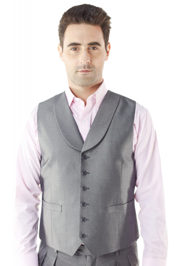 As refined as it is easygoing, this 6-button made to measure waistcoat is all you'll need to liven up any seasonal look. This custom tailored single-breasted layering piece features details like shawl collar, handmade welted pocket, cloth back with adjustable buckle and high gorge.