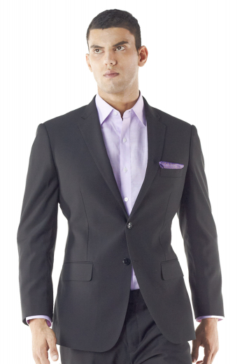 A custom tailored comfortably cut tailor made two button dress jacket with handmade notch lapels, a boutonniere, hand molded shoulders, and a made to order center vent perfect for you.

