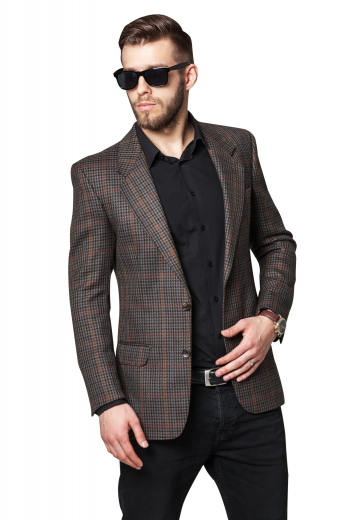 This stunning mens custom made brown plaid jacket in cashmere wool is an iconic formal from the luxurious range of affordable formals at My Custom Tailor. This mens made to order plaid jacket has 2 notch lapels with 1 boutonniere on the left lapel. This mens custom made slim fit brown jacket also features 2 front close buttons, 1 upper welt pocket, and 2 lower pockets with flaps. Wear this mens bespoke cashmere wool plaid jacket to interviews and board meetings for a lasting impression.