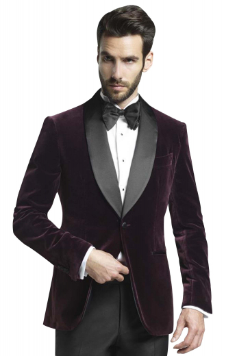 This mens tailor made velvet tux features a bespoke dinner jacket in wine and custom made grey dress pants. The mens handmade slim fit jacket has a shawl collar with grey satin facing lapels, 2 satin piped lower pockets, 1 upper welt pocket, and 1 front close button. The mens bespoke slim fit dress pants have 2 front slash pockets, 2 back pockets, a zip fly, and a 2 point button and hook closure. Buy this stunning mens handmade slim fit dinner suit at My Custom tailor to flaunt a dapper look at weddings and corporate parties. 