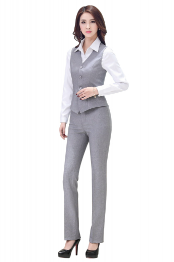 Flattering womens handmade grey pant suit in cashmere. Perfect autumn garment from the office-wear collection at My Custom Tailor. It has a womens handmade slim fit vest and womens bespoke flat front pants. The womens made to order single breasted vest has a V neck, 2 lower welted pockets, and a cloth back with an adjustable buckle for classy fitting. The womens bespoke full length suit pants with a slim cut fitting is hand sewn with belt pockets and a 2-point button and hook closure. Wear it to flaunt a stylish look at work.